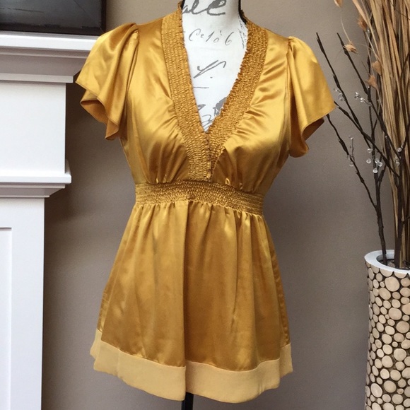 BCBGMaxAzria Tops - BCBG Maxazria gold blouse Size S